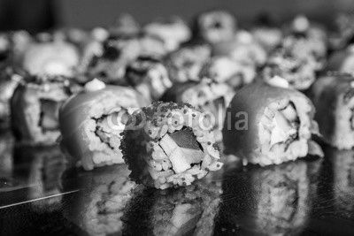 Various kind of sushi food served on black background. Best Types of Sushi Rolls