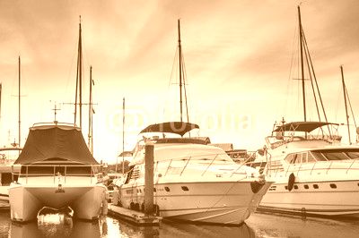 Yacht and boats at the marina in the evening