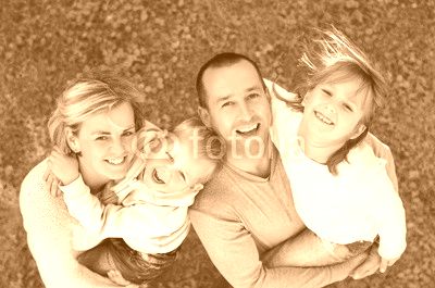 portrait of a happy family smiling a top view