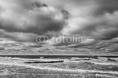 Sandy yellow beach with cloudy sky, Baltic Sea