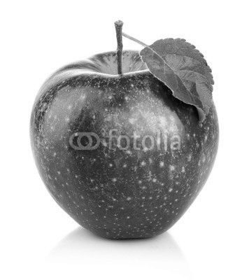 Red apple with green leaf isolated on a white