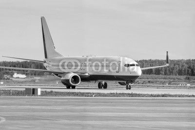Taxiing aircraft on the main taxiway