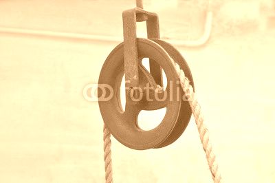 Iron pulley with rope.