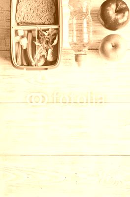 kid menu lunchbox for school top view on wooden background