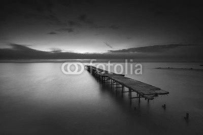 Old broken bridge in the sea, long exposure