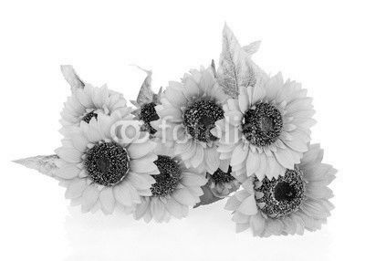Composition of bright artificial sunflowers on white background.