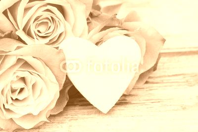 roses with white heart on wood
