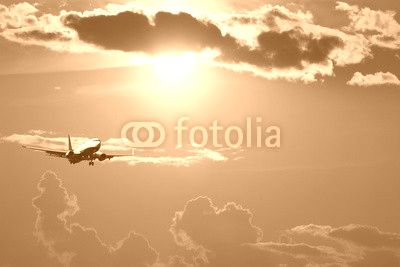Silhouette of airplane with a beautiful sky