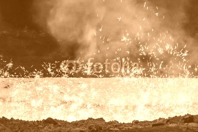 iron stream and sparks at a metallurgical plant