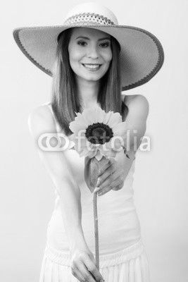 portrait attractive woman with sunflower