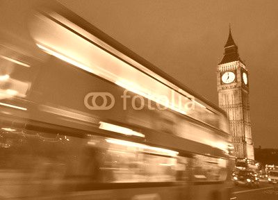Big Ben and a red double-decker bus at night, London,