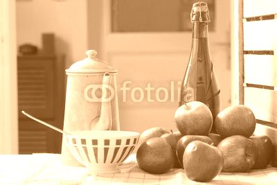 bottle of cider with fresh apples