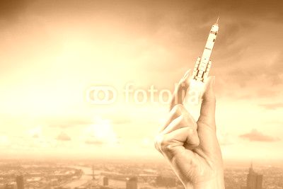 Hand giving rocket . Mixed media