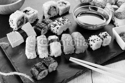 Slate tray of assorted sushi