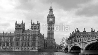 Dolly view of the House of Parliament and the Big Ben by Westminster bridge in London