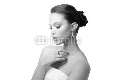 beautiful woman with earring, ring and pendant