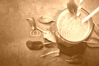 Healthy green spinach smoothie in glass. Clean eating and healthy food.