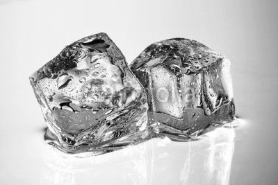 Ice cubes with drops isolated