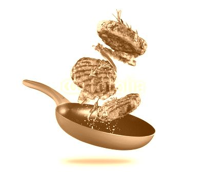 Beef milled meat flying from a pan on white background