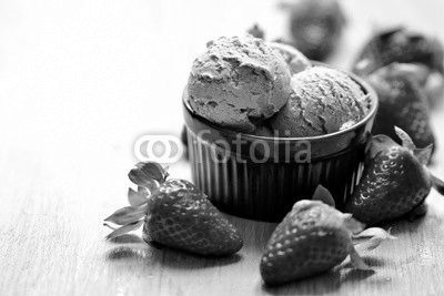 Strawberries and ice cream in a bowl