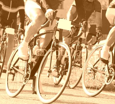 fast cyclists on racing bikes run during the sports competition