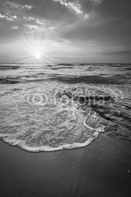 Sunray over sea in Tuscany