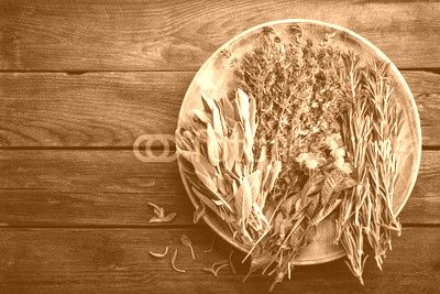 various fresh herbs, rosemary, thyme, mint and sage on wooden background