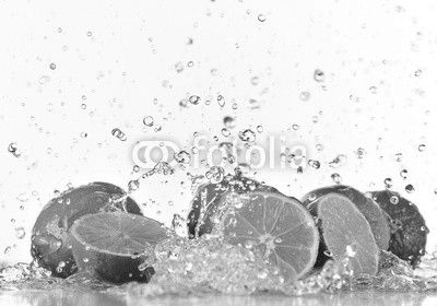 Limes with water splash