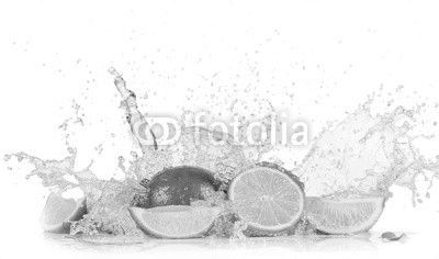 Limes with water splash
