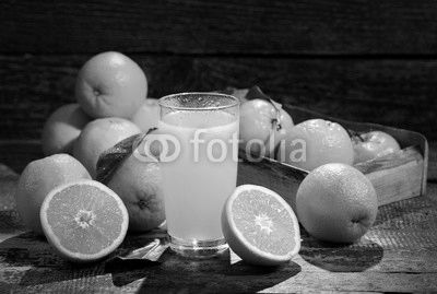 glass of orange juice with fresh fruits