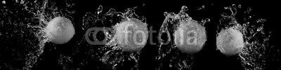 Set of fresh oranges in water splash