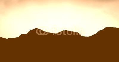 Silhouette mountains against sky