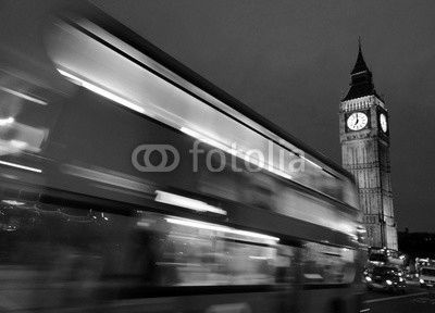 Big Ben and a red double-decker bus at night, London,