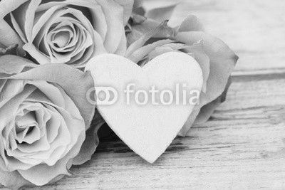 roses with white heart on wood