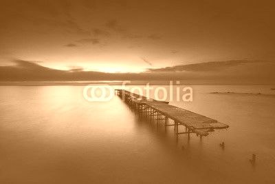 Old broken bridge in the sea, long exposure