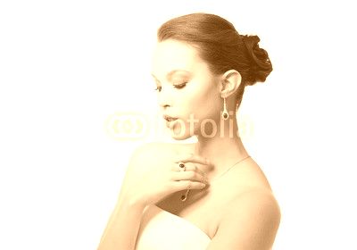 beautiful woman with earring, ring and pendant