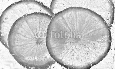 lime with bubbles isolated on white