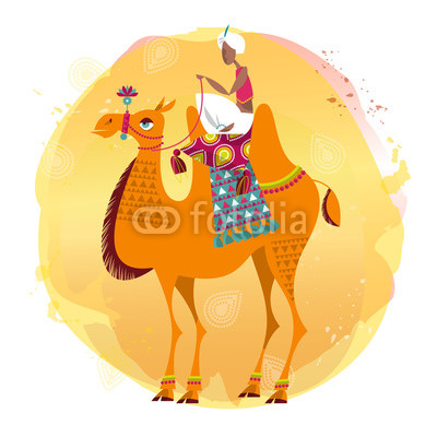 Man sitting on a decorated camel.