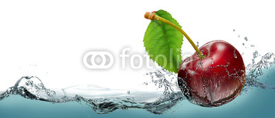 Juicy cherry berry in a spray of cool water.