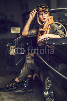 Audrey in an old car