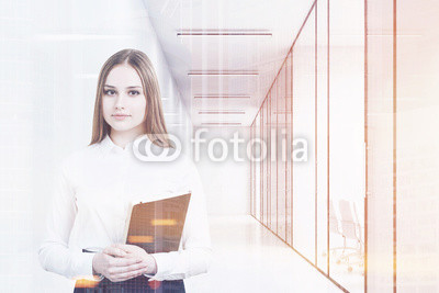 Young girl in an office suit is holding a black folder and standing in a white office corridor with conference rooms. 3d rendering. Mock up. Toned image. Double exposure