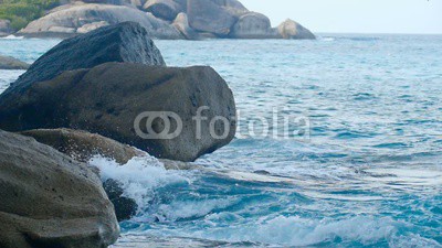 Turquoise rolling wave, slow motion
