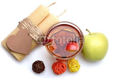 apple tea with cinnamon, candle, valentines heart isolated on white