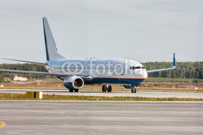 Taxiing aircraft on the main taxiway