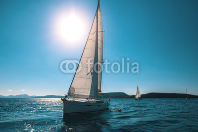 Luxury yachts at sea sailing regatta.