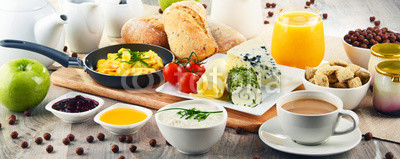 Breakfast served with coffee, cheese, cereals and scrambled eggs