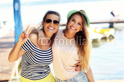 friends having fun outdoors in summer