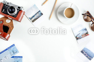 vacation concept with traveller outfit on white background top view space for text