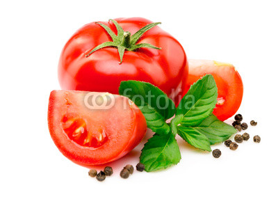 Tomatoes, basil leaves and black pepper on white.