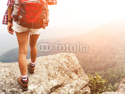 Girl hipster Freedom traveler on the mountian.